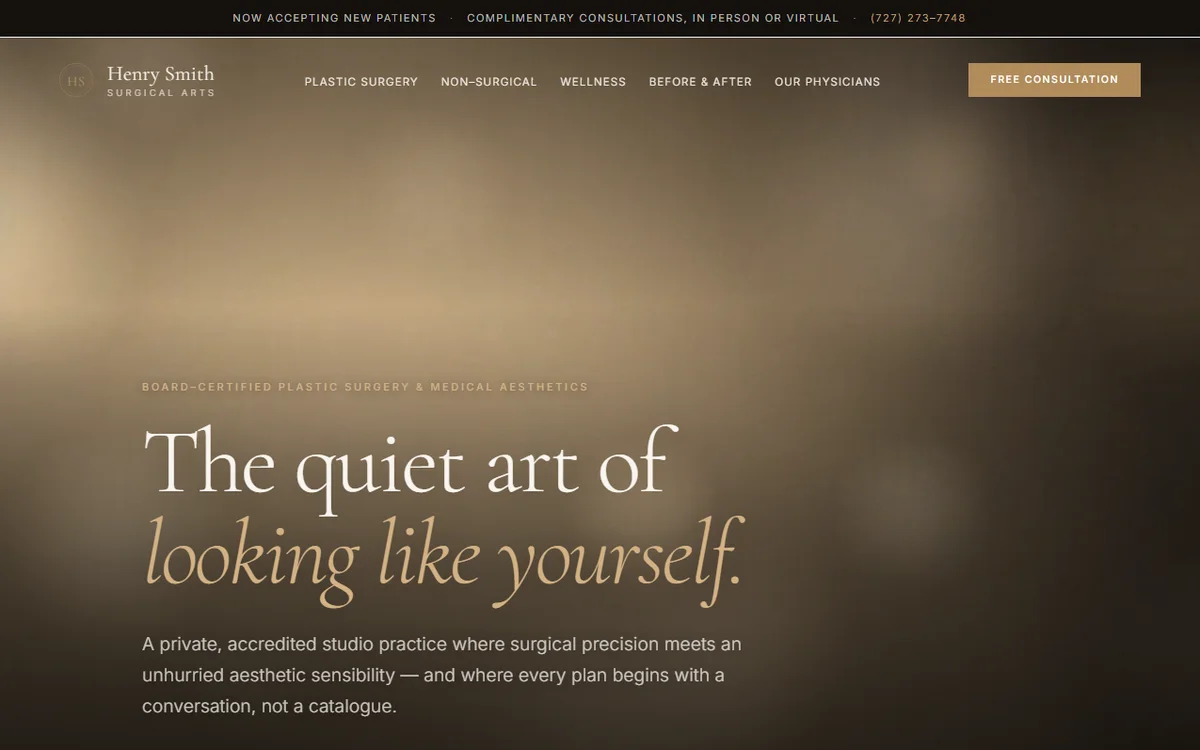 The Henry Smith Surgical Arts homepage — a warm, softly lit studio interior behind the headline ‘The quiet art of looking like yourself.’