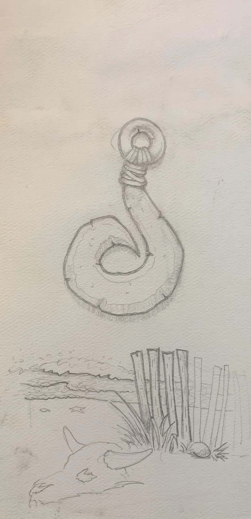 Pencil study of a carved fish hook pendant above a beach scene with a dune fence and a leaping dolphin.